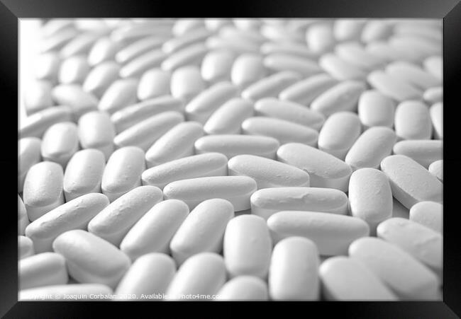 Macro close-up of many white pills, medication concept Framed Print by Joaquin Corbalan