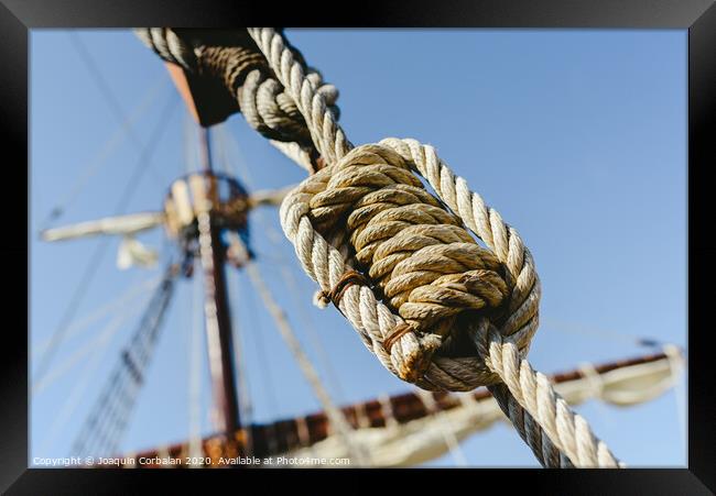 Rigging and ropes on an old sailing ship to sail in summer. Framed Print by Joaquin Corbalan