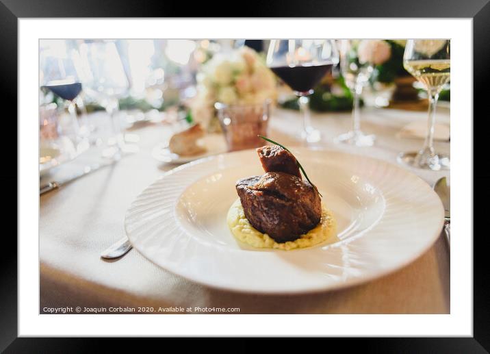 Meat dish served elegantly in a luxurious wedding in an event restaurant. Framed Mounted Print by Joaquin Corbalan