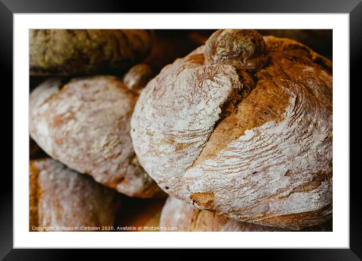 Mediterranean traditional handmade round breads Framed Mounted Print by Joaquin Corbalan