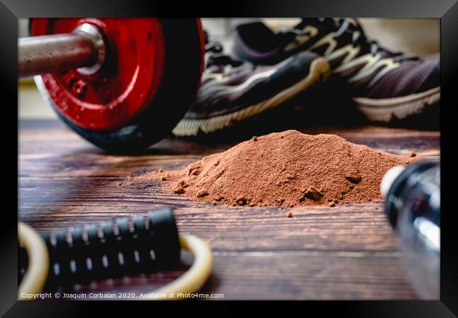 Athletes need to consume extra protein powder supplement, in the image with cocoa flavor, to improve their sports performance. Framed Print by Joaquin Corbalan