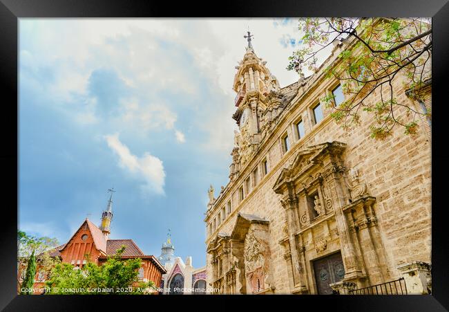 Turistic square Central Market of Valencia, near the Lonja de la Seda, view of the roofs of buildings one day with clouds in the sky. Framed Print by Joaquin Corbalan