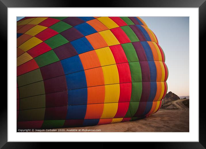 Colorful balloons flying over mountains and with blue sky Framed Mounted Print by Joaquin Corbalan