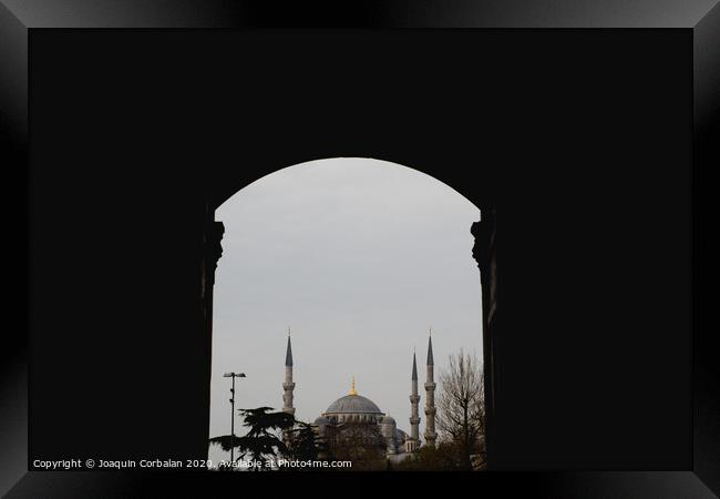 minarets in the city for the prayer of the Muslim religion Framed Print by Joaquin Corbalan