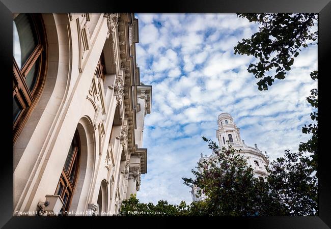 Facade of large institutional building with large columns and windows, background sky, low angle shot, in Valencia. Framed Print by Joaquin Corbalan