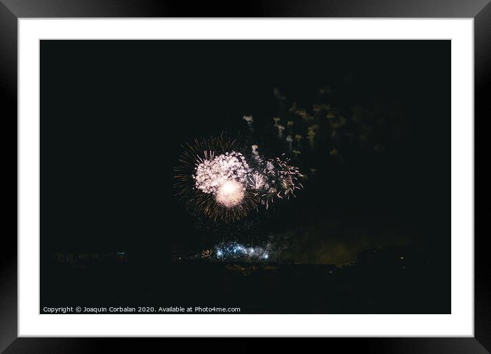 night fireworks over the city Framed Mounted Print by Joaquin Corbalan