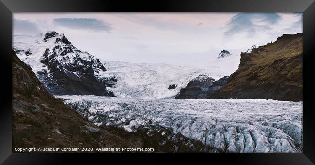 Huge glacier, view of the tongue and its large blocks of ice. Framed Print by Joaquin Corbalan