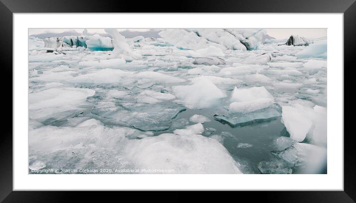 Glacier lake full of large blocks of ice. Framed Mounted Print by Joaquin Corbalan