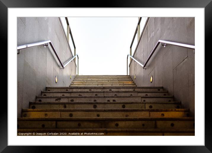 Granite staircase with handrails at the entrance of an underground pedestrian tunnel. Framed Mounted Print by Joaquin Corbalan