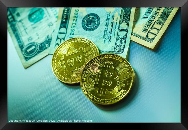 Bright bitcoin coins next to dollar bills. Framed Print by Joaquin Corbalan