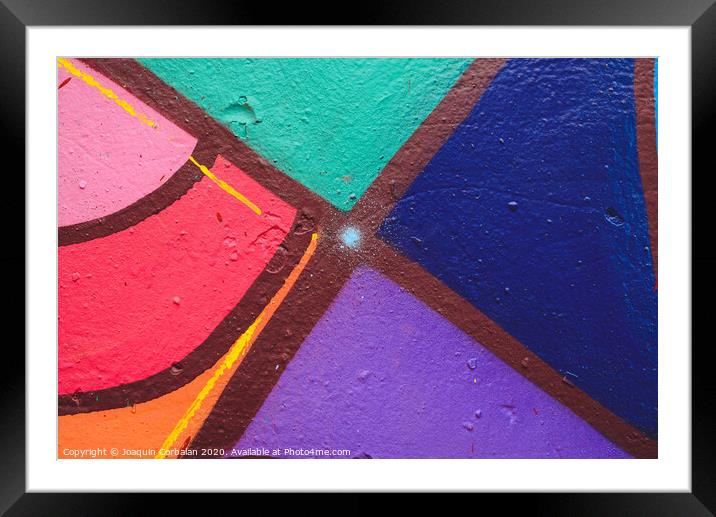 Detail of an anonymous street graffiti with many colors, cheerful urban background. Framed Mounted Print by Joaquin Corbalan