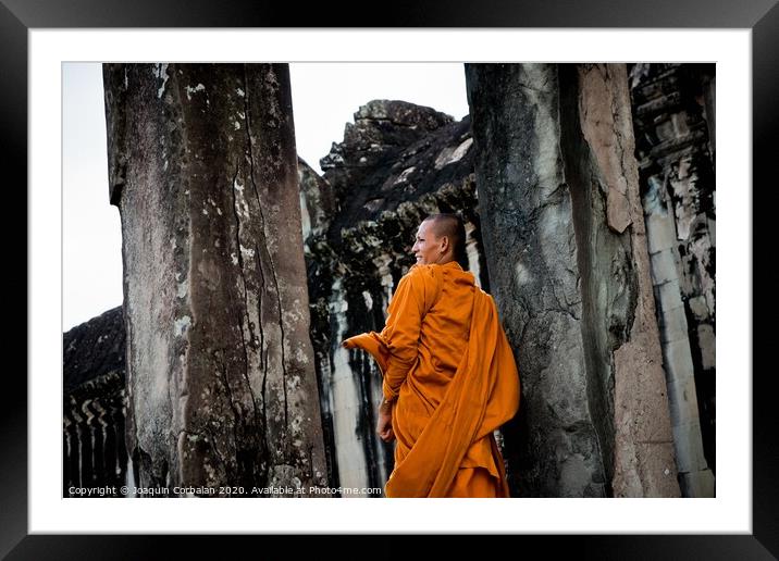 Khsach Kandal, Cambodia - 28 October 2011: Tibetan monks in orange robes visiting remote Cambodian temples to meditate. Framed Mounted Print by Joaquin Corbalan