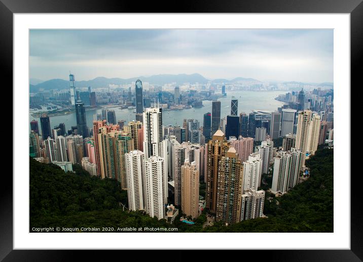 Vew of the skyscrapers and the Hong Kong Bay from above. Framed Mounted Print by Joaquin Corbalan