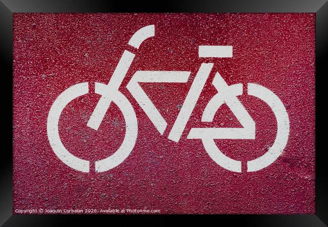 Symbol of a bicycle indicating a bike lane to pedal safely. Framed Print by Joaquin Corbalan