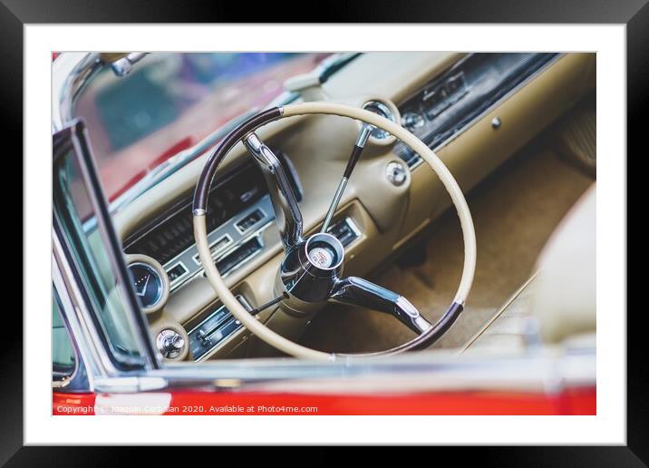 Valencia, Spain - July 21, 2012: Dashboard and steering wheel of a luxury vintage car, an American Mustang. Framed Mounted Print by Joaquin Corbalan
