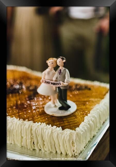 Desserts and wedding cake with very sweet cupcakes at an event. Framed Print by Joaquin Corbalan