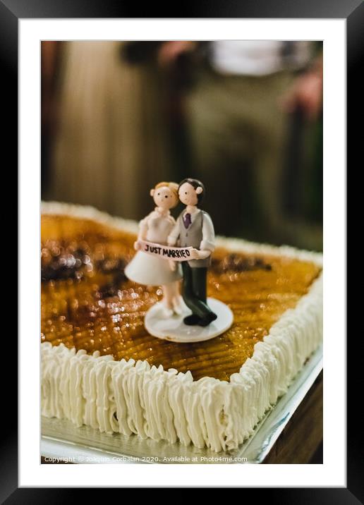 Desserts and wedding cake with very sweet cupcakes at an event. Framed Mounted Print by Joaquin Corbalan