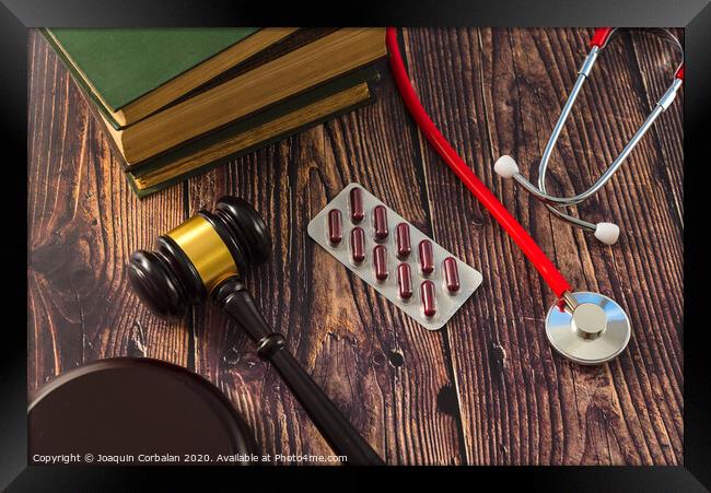 Gavel as a symbol of medical justice, applied by doctor judges. Framed Print by Joaquin Corbalan
