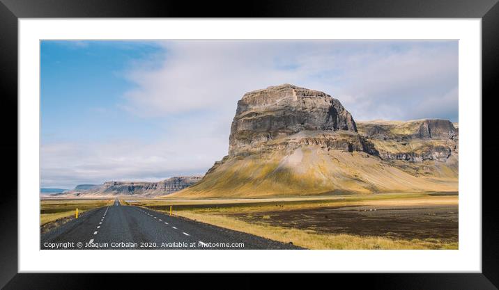 Icelandic lonely road in wild territory with no one in sight Framed Mounted Print by Joaquin Corbalan