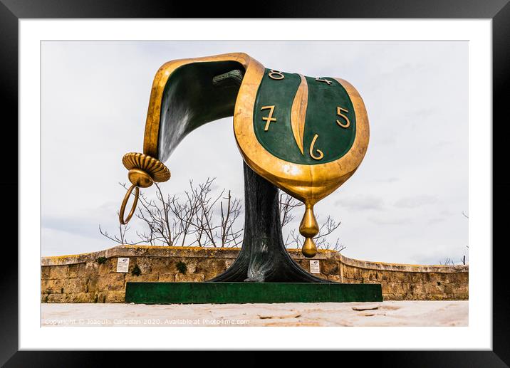 Sculpture Dalí's melted clock displayed on the street on the occasion of the cultural capital of the city. Framed Mounted Print by Joaquin Corbalan