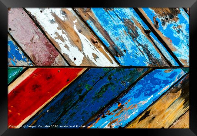 Painted wooden boards of various colors aged, natural texture background. Framed Print by Joaquin Corbalan
