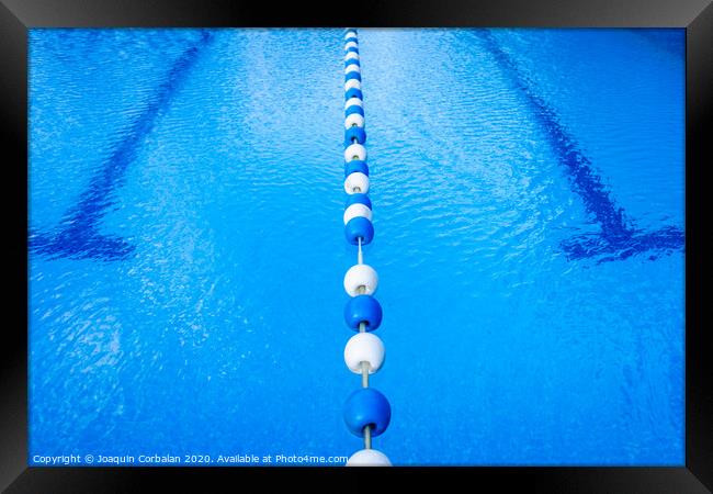 Detail of the water of a pool with beacons to separate the swimming streets. Framed Print by Joaquin Corbalan