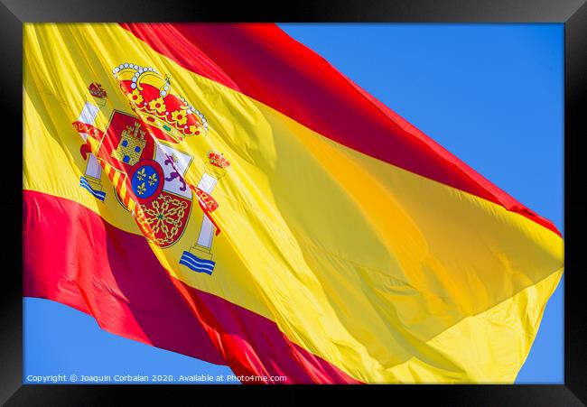 Close-up of the flag of Spain waving in the wind. Framed Print by Joaquin Corbalan