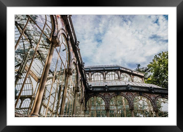 Exterior of the Crystal Palace in Madrid, a must for tourists, in the Retiro Park. Framed Mounted Print by Joaquin Corbalan