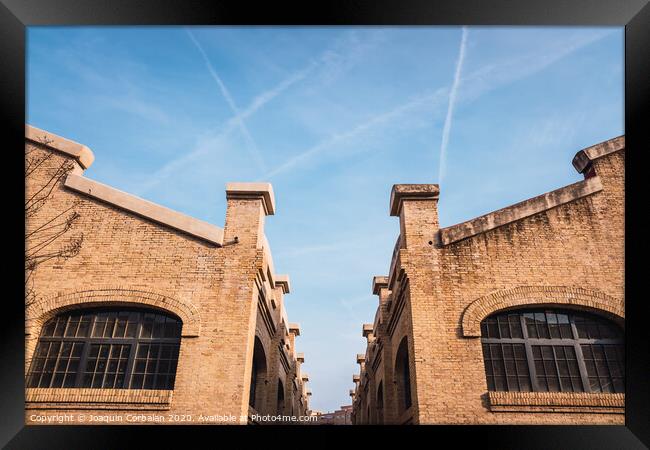 Old brick industrial buildings renovated for social uses of the city in Valencia, Spain. Framed Print by Joaquin Corbalan
