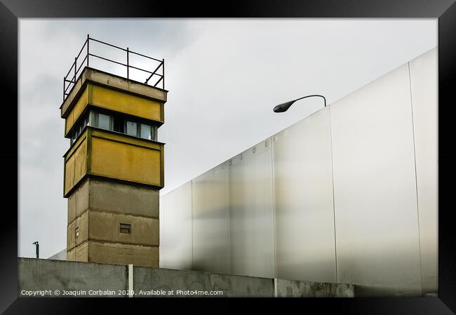 Berlin, Germany - June 6, 2019: Watchtower next to a wall on a border to control illegal immigrants. Framed Print by Joaquin Corbalan