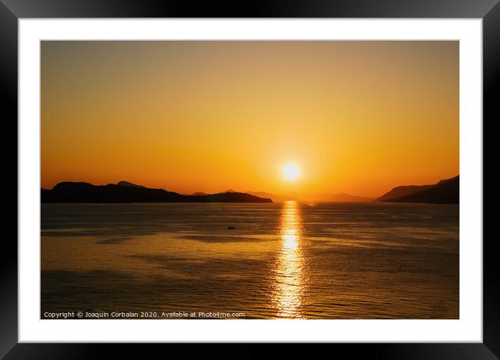 Sunset on the Adriatic coast between mountains. Framed Mounted Print by Joaquin Corbalan