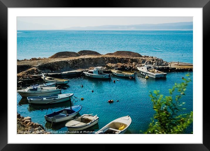 Sports and recreational nautical harbor in a bay protected naturally between the mountains of Croatia. Framed Mounted Print by Joaquin Corbalan