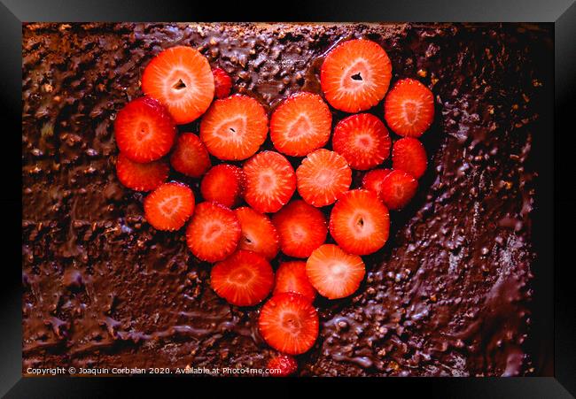 Sliced strawberry cut on a cake on a tray before baking it, with a heart shape. Framed Print by Joaquin Corbalan
