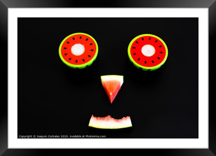 Composition of a funny face made with fruit, smile of a watermelon for summer diets. Framed Mounted Print by Joaquin Corbalan
