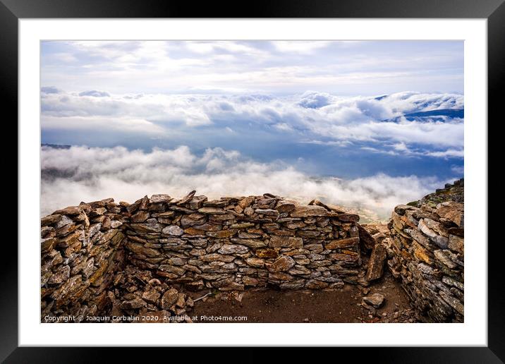 Stone shelter on top of the mountainous peak of Peñarala, in the Sierra de Guadarrama, Spain. Framed Mounted Print by Joaquin Corbalan