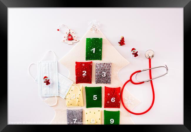 Traditional advent calendar protected with medical face masks, isolated on white background. Framed Print by Joaquin Corbalan