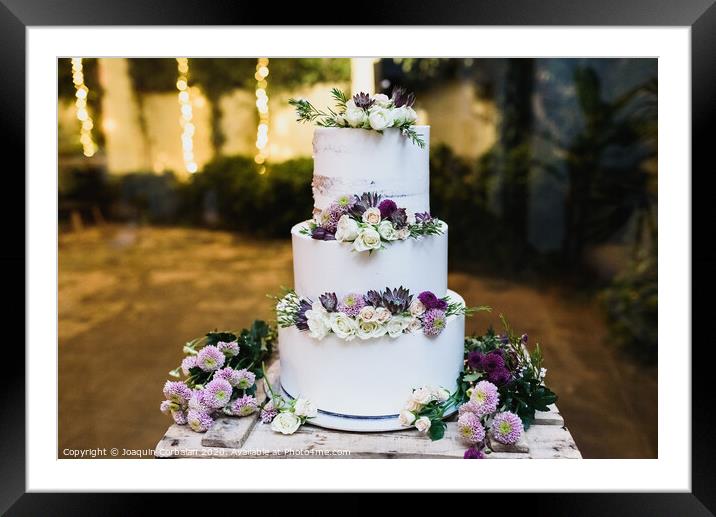 Pretty three-tier wedding cake decorated for a wedding event. Framed Mounted Print by Joaquin Corbalan