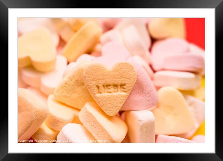 Word love written in German on a candy heart, sweet image for Va Framed Mounted Print by Joaquin Corbalan