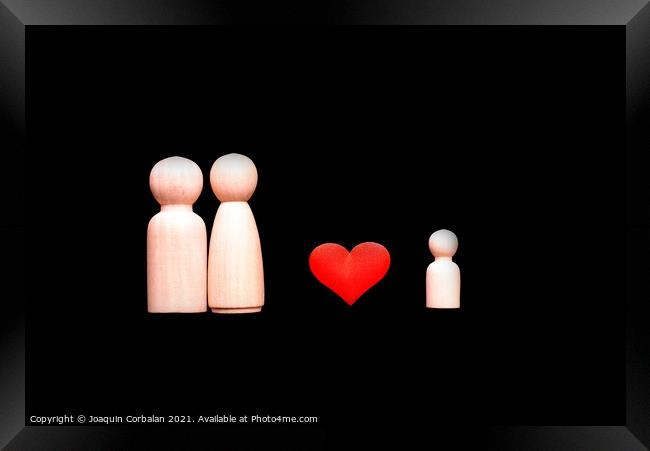 Wooden figures representing the love of the family, parents who  Framed Print by Joaquin Corbalan