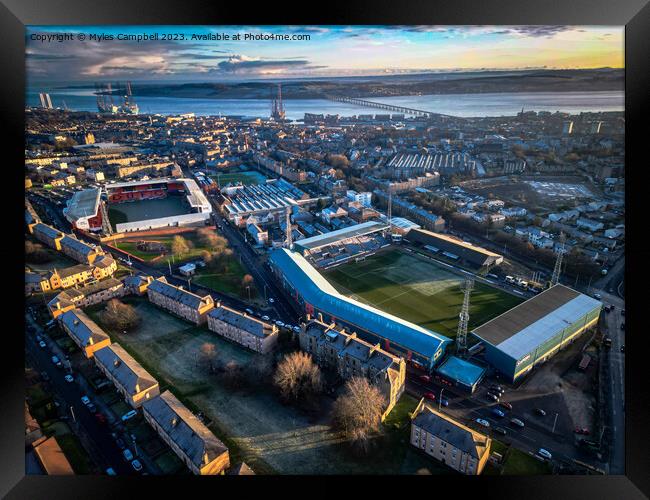 Dens Park and Tannadice Park stadiums, Dundee Framed Print by Myles Campbell