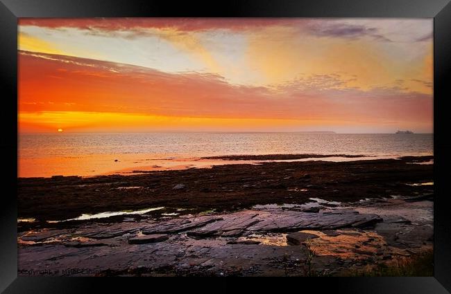 Ferry approaching the Orkney sunset Framed Print by Myles Campbell