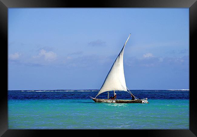 Wooden sailing boat at sea Framed Print by Simon Marshall