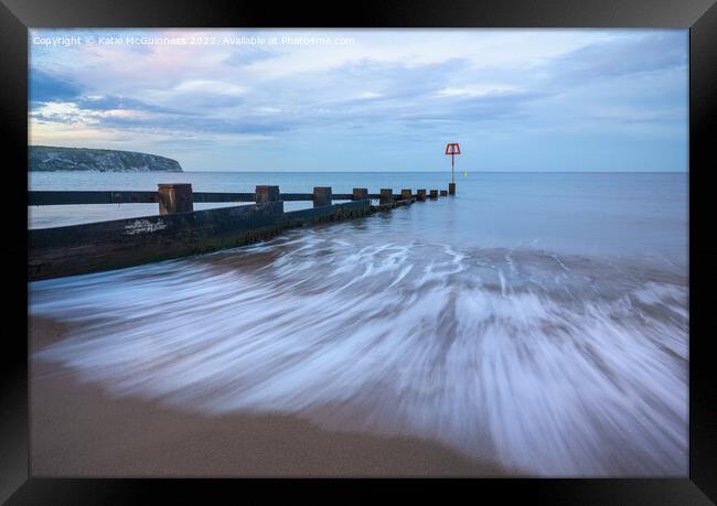 Swanage beach sunset Framed Print by Katie McGuinness