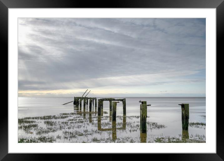 The old pier at Snetisham Beach Framed Mounted Print by Robbie Spencer
