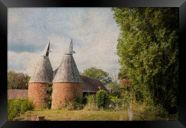 A farm in the countryside with an Oast House build Framed Print by David Wall
