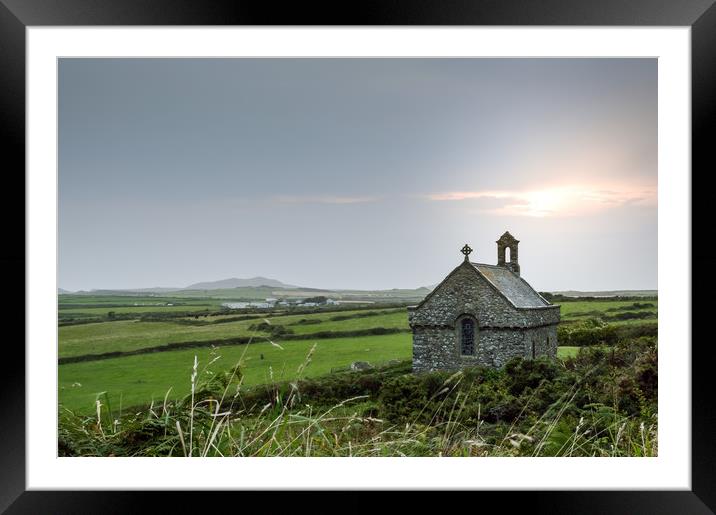 The isolated St Non's Chapel with the sun setting  Framed Mounted Print by David Wall