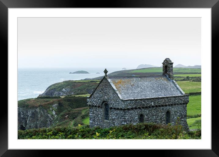 St Non's Chapel on the edge of a wild rugged coast Framed Mounted Print by David Wall