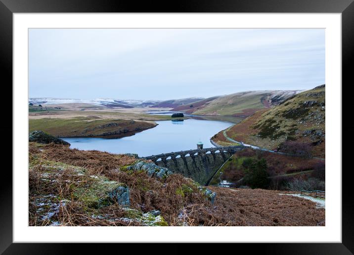 The bleak moorland and water landscape of the Elan Framed Mounted Print by David Wall