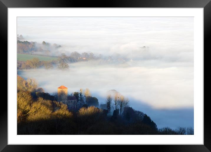 Looking down on Little Malvern Priory on a misty w Framed Mounted Print by David Wall