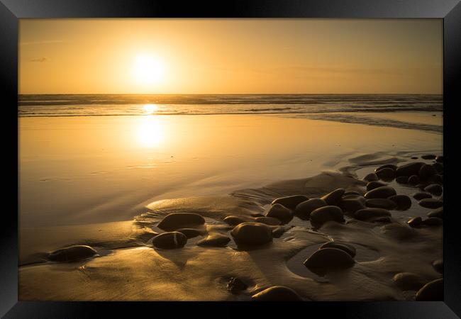 Sunset pebbles Framed Print by Tony Twyman